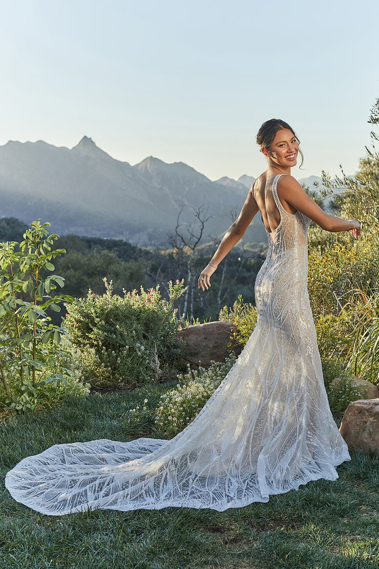 Kia is pure glamour, with beaded and sequined appliqués threaded in silver throughout.