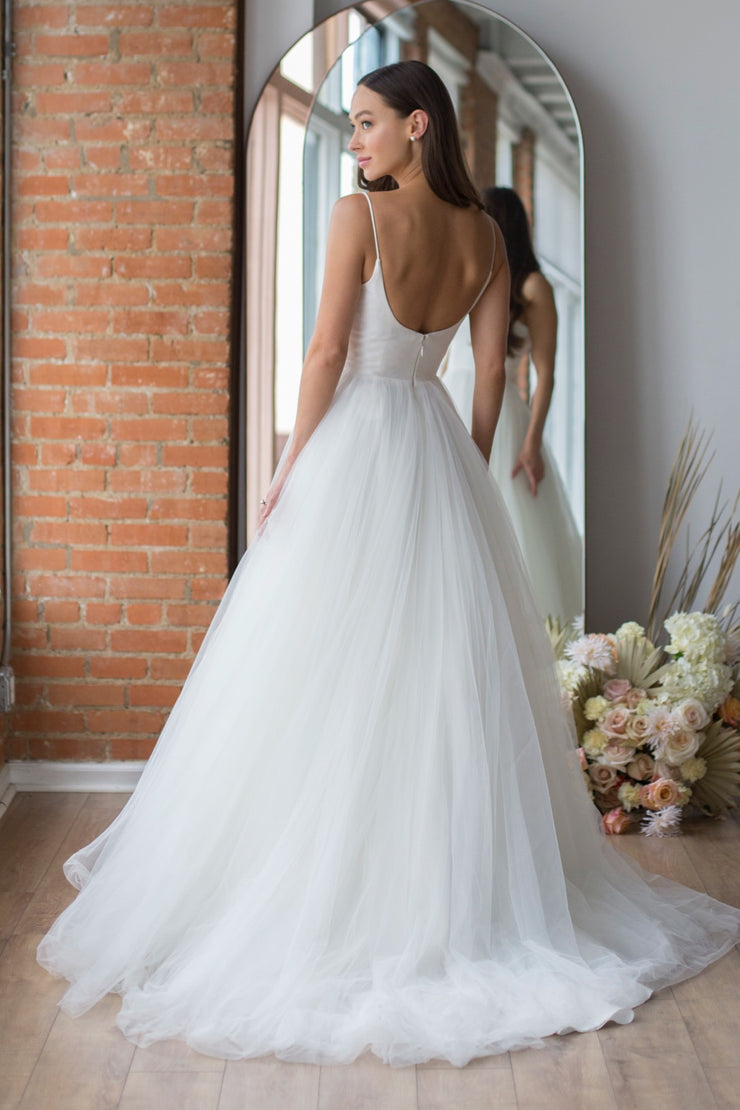 Wtoo Gigi by Watters We’ve mixed our Mikado and Soft net tulle for a perfectly ethereal juxtaposition, structured and relaxed. Gigi’s supportive yet delicate ballet neck is paired with a soft, easy A-line skirt to create a classic bridal look.