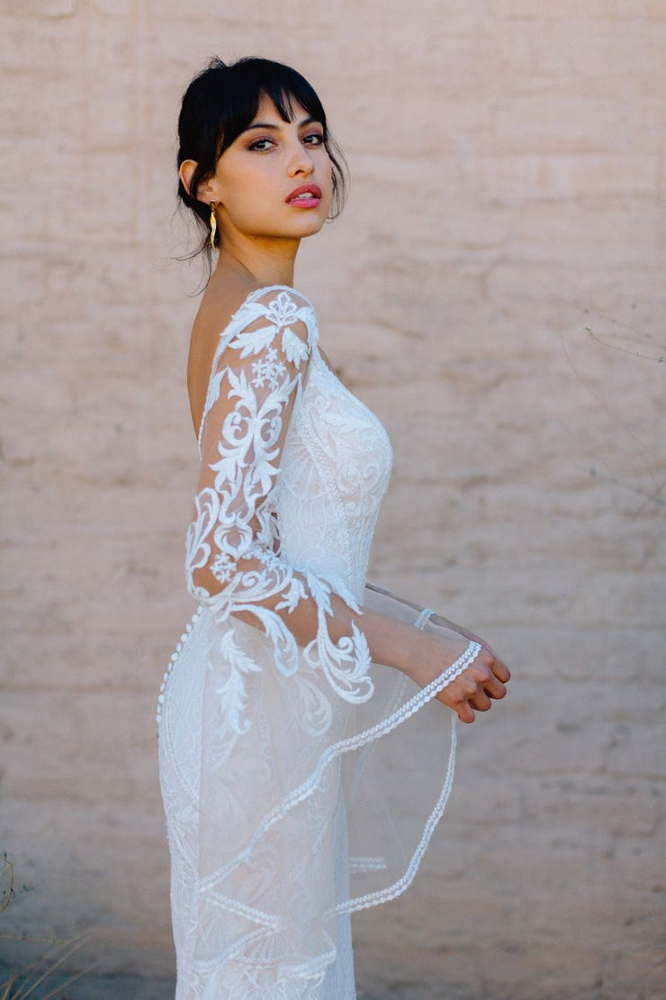 Allure Bridals Wilderly F231 - Blair With a sheer butterfly back and ethereal illusion sleeves, Blair is pure magic.